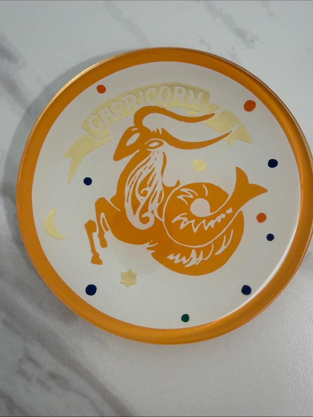 C. Wonder Orange and Gold Capricorn Decorative Plate